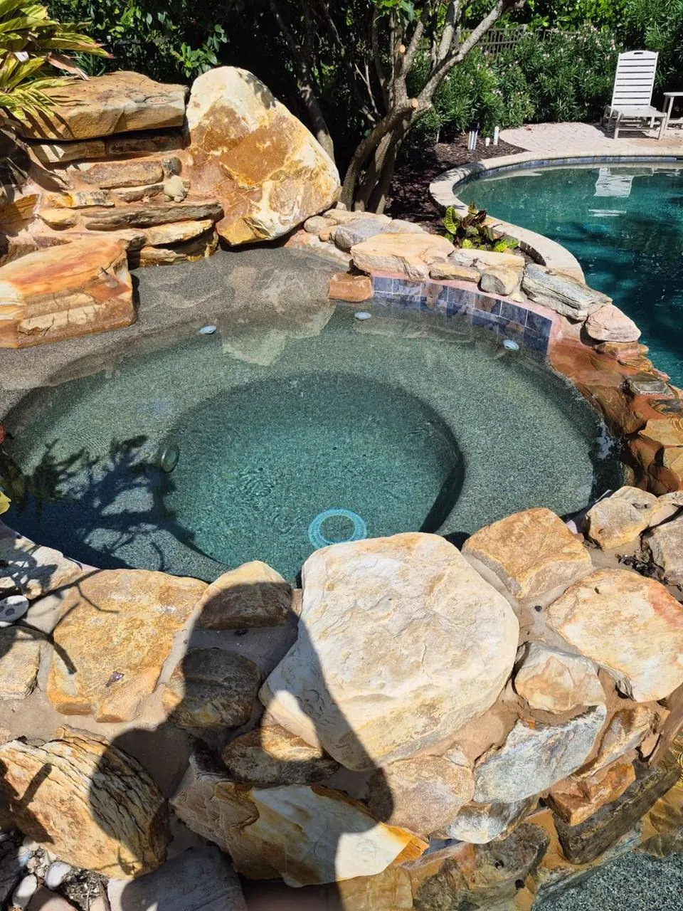 Rock-lined spa and pool